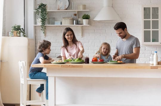 family using remodeled kitchen