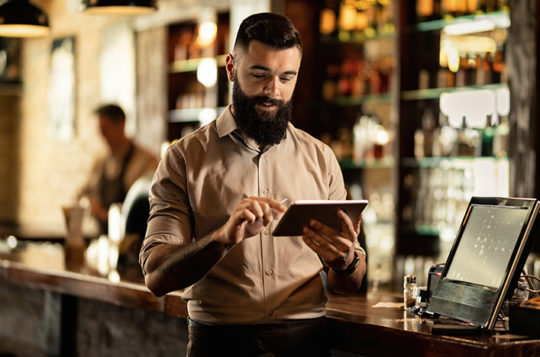 man at cash register