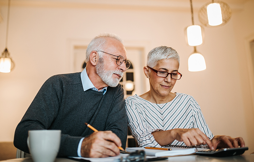 older couple looking at paperwork