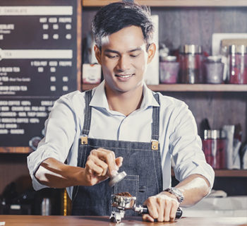 barista working in coffee shop