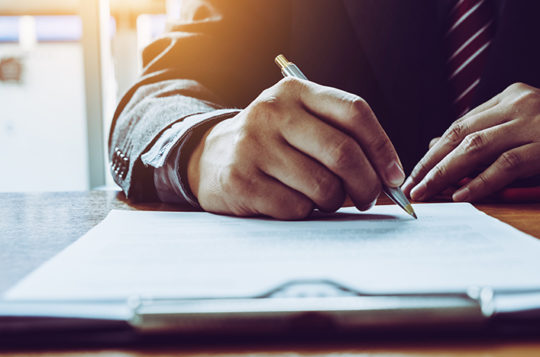 person signing document